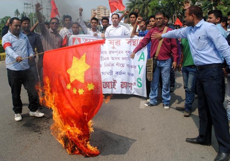Indians burning a Chinese flag